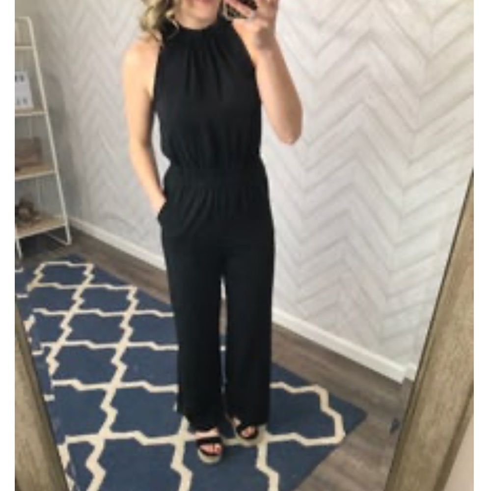 Brand new with tags black jumpsuit/romper/pantsuit!